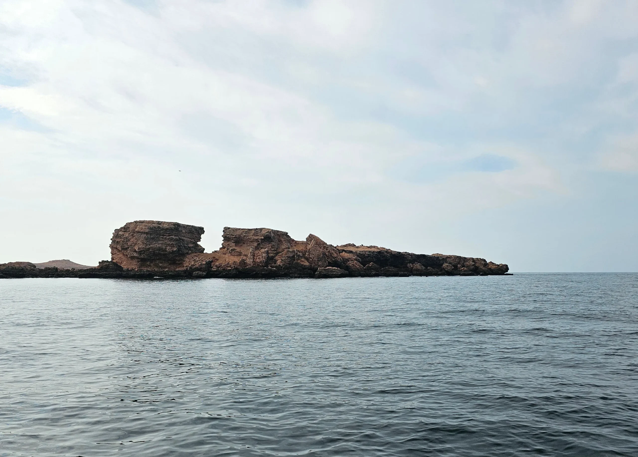 Admire the rugged rocky islets and scenic coastal landscapes of Oman's Daymaniyat Islands.